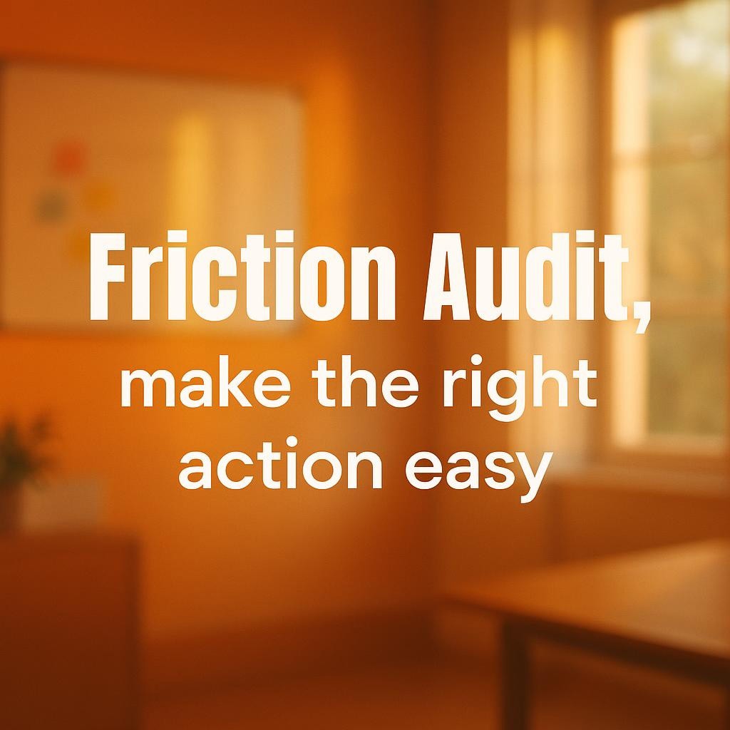 Typography hero image reading Friction Audit, make the right action easy with a white oval underline on Friction Audit over a warm orange background, natural light, and a softly blurred office scene.